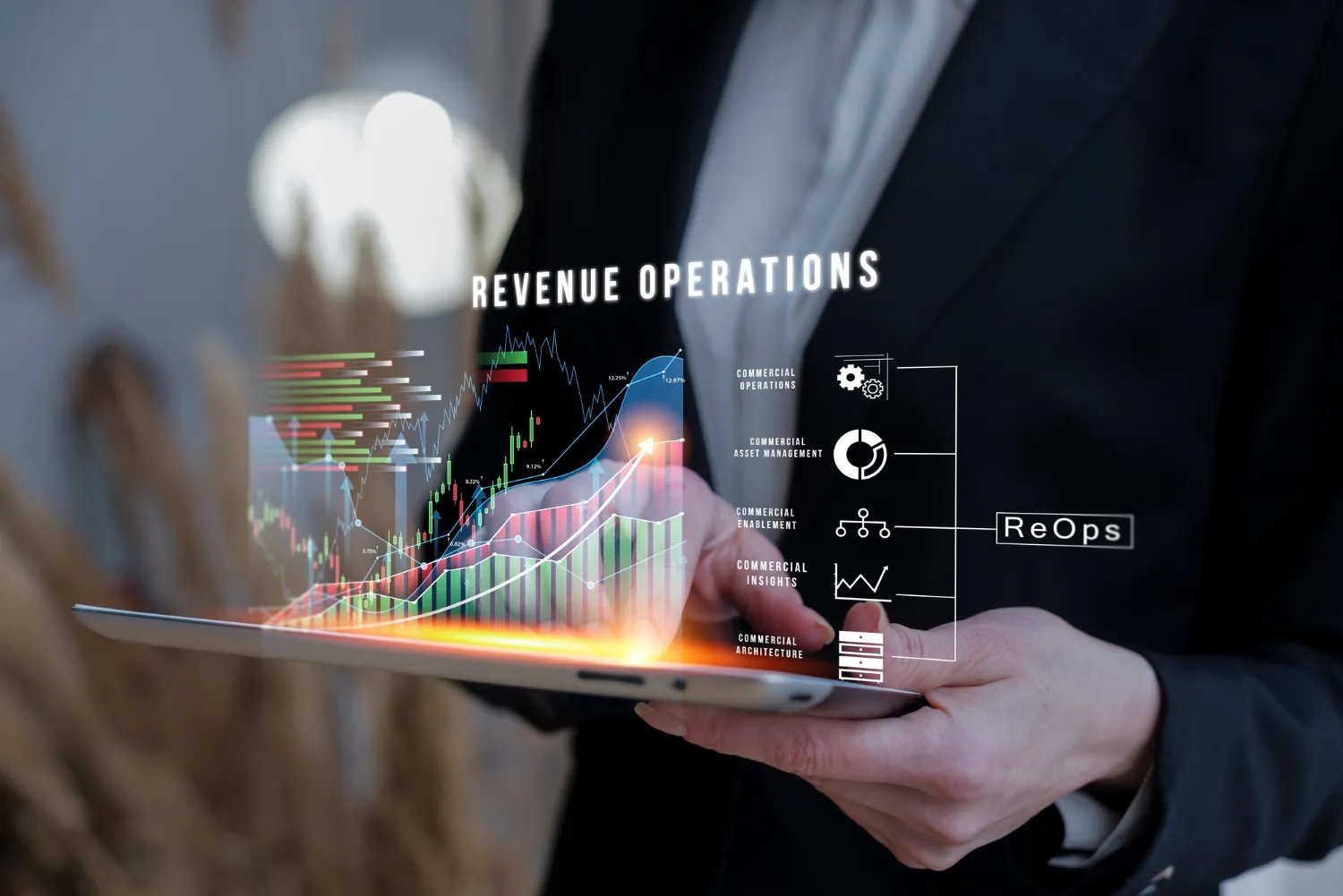 A person holding a tablet displaying futuristic revenue operation analytics, illustrating the theme of financial regulatory evolution and technological innovation, as explored by JOH Partners.